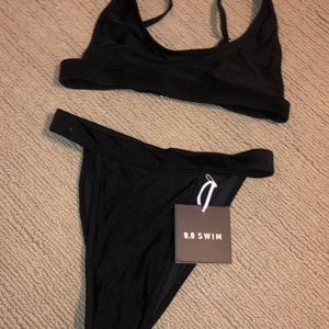 Beginning boutique swimsuit with tags